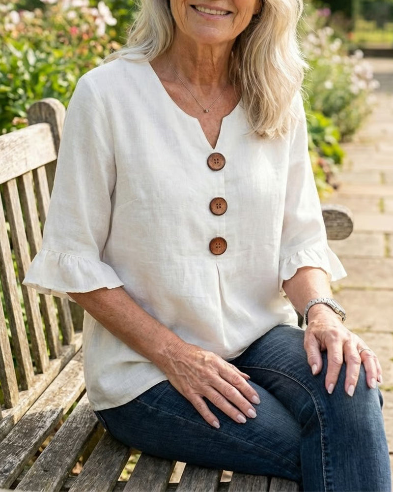 Marina Roca Blusa Inés de algodón-lino lisa con botones de madera y volantes – photo 10