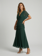Marina Roca Nora | Vestido largo con cuello en v – photo 11